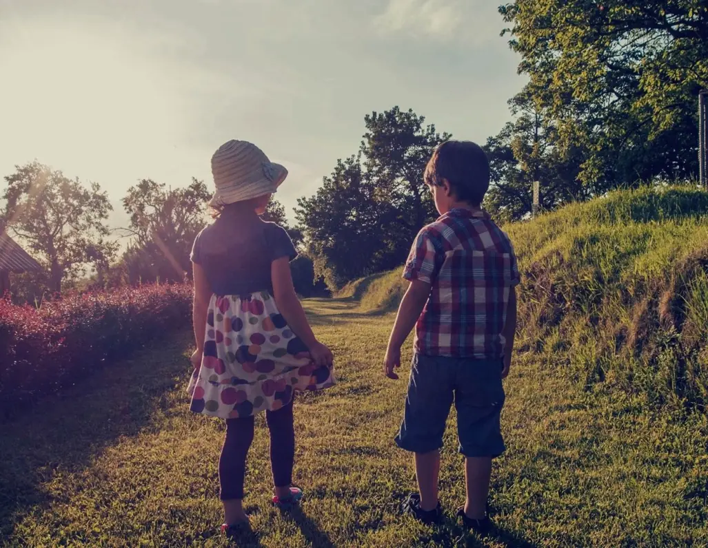 Children walking together outdoors