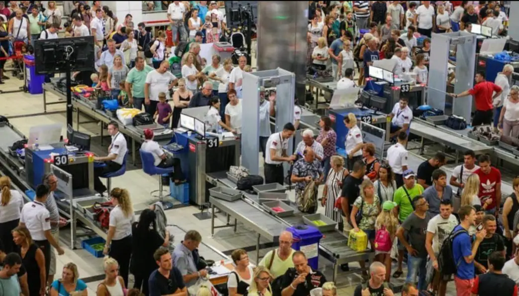A busy airport security area