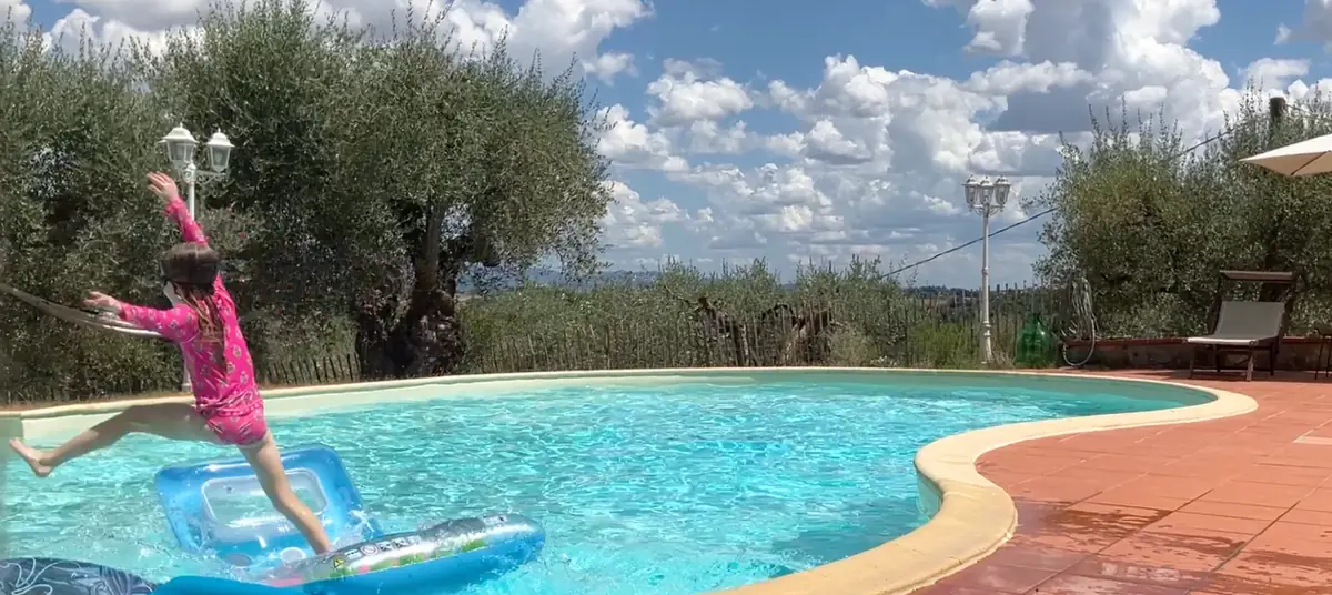 A family holiday by a swimming pool